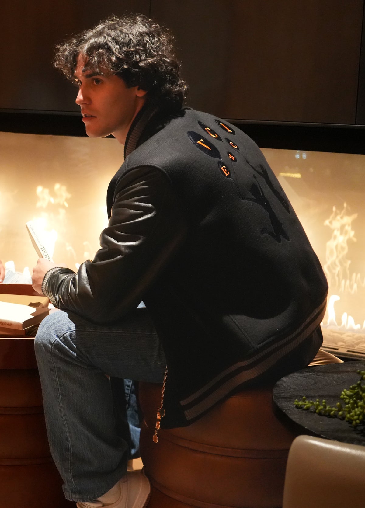 Cashmere-wool varsity jacket — lambskin sleeve detail