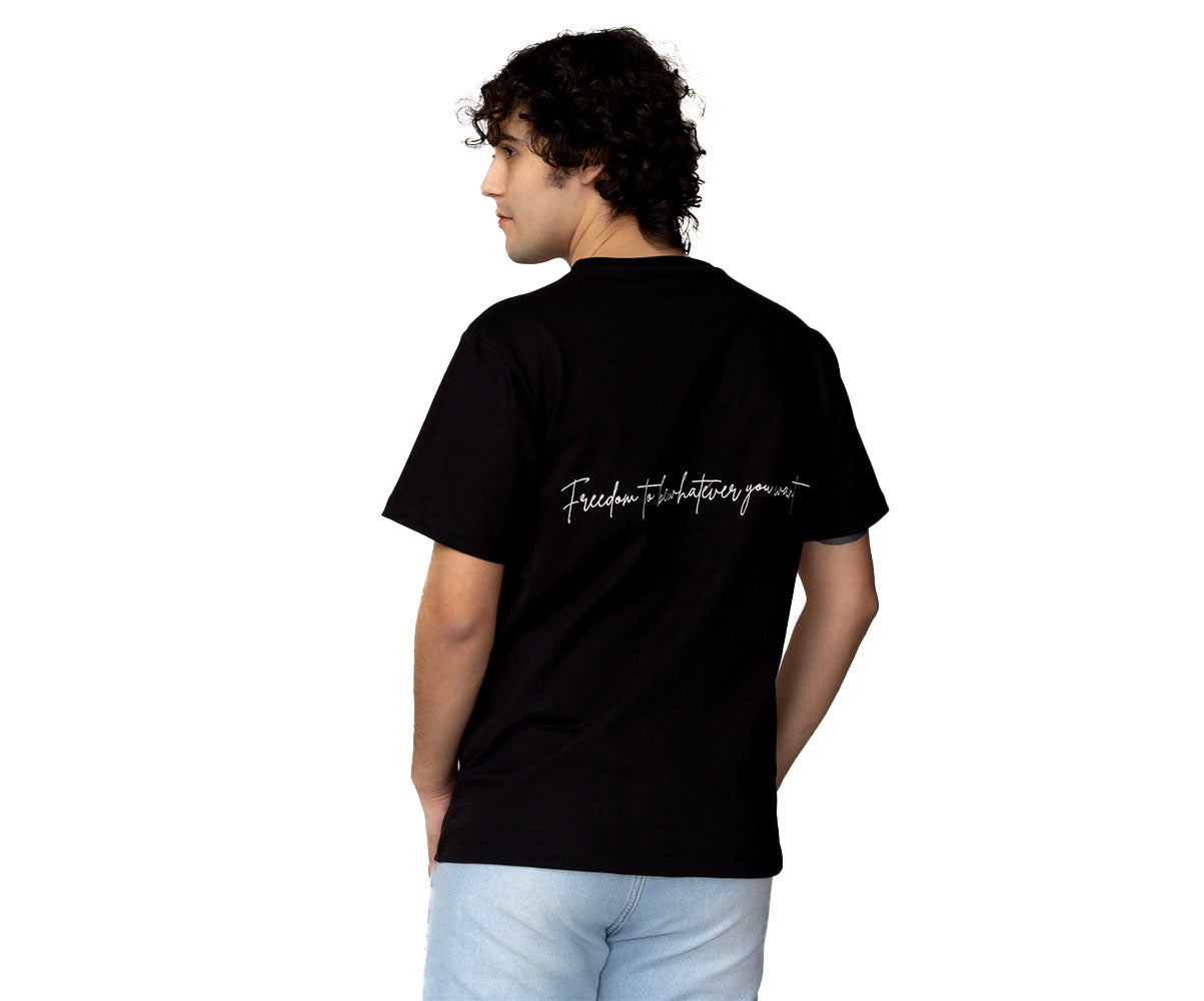 The Jump orange embroidery tee — styled view