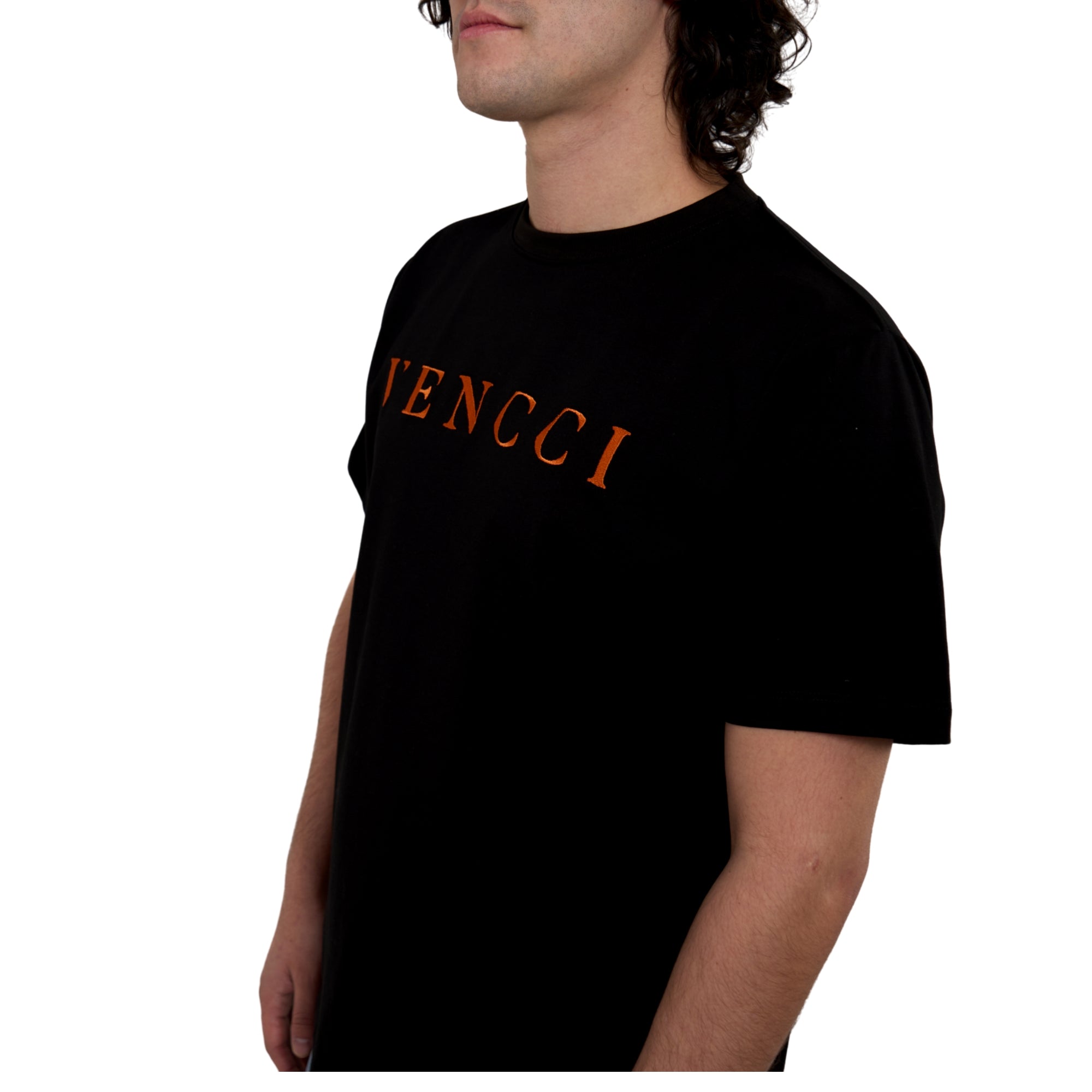 Vivid Orange embroidery tee — worn by model